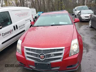 2009 Cadillac CTS AWD w/1SB with VIN 1G6DS57V490128140, listed as a IAAI auction lot 42001773 with 95,597 mi miles. Bid and sale history available at carsss.com. Image 6.