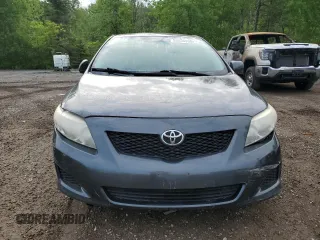2010 Toyota Corolla with VIN 2T1BU4EE0AC397936, listed as a Copart auction lot 55936965 with 409,437 mi miles and Clean title. Bid and sale history available at DreamBid. Image 5.