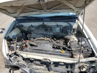 1993 Toyota T100 DX z VIN JT4VD10A5P0010588, wystawiony jako Copart lot #63862014 z przebiegiem 295 012 mil mil oraz Czysty tytuł • Clean title. Historia ofert i sprzedaży dostępna na DreamBid. Obrazek 11.