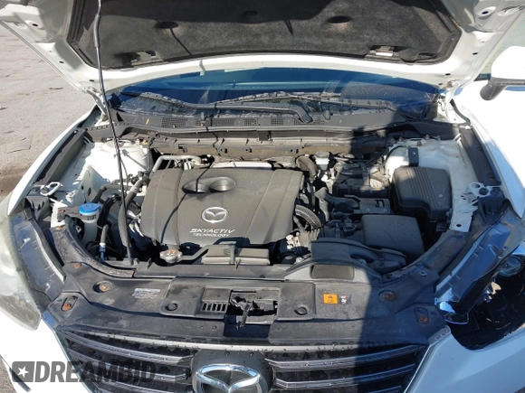 2016 Mazda CX-5 Sport with VIN JM3KE4BY8G0605504, listed as a IAAI auction lot 41866173 with 91,797 mi miles. Bid and sale history available at carsss.com. Image 10.