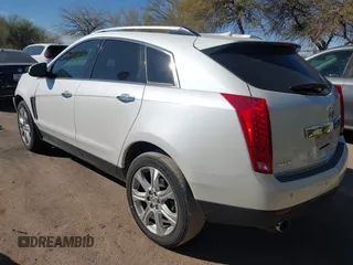 2013 Cadillac SRX Performance Collection with VIN 3GYFNDE37DS599557, listed as a IAAI auction lot 41633569 with 100,611 mi miles and . Bid and sale history available at DreamBid. Image 3.