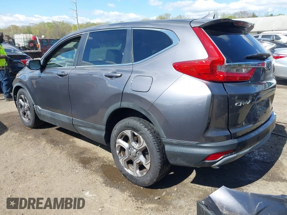 2017 Honda CR-V EX with VIN 2HKRW2H5XHH678674, listed as a IAAI auction lot 42039505 with 124,891 mi miles. Bid and sale history available at carsss.com. Image 3.