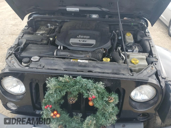 2015 Jeep Wrangler Unlimited Sahara with VIN 1C4BJWEG3FL530114, listed as a Copart auction lot 49444135 with 156,669 mi miles and Salvage Title. Bid and sale history available at carsss.com. Image 12.