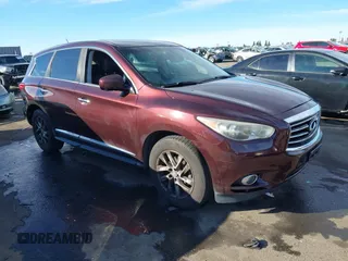 2013 Infiniti JX35 with VIN 5N1AL0MM0DC324641, listed as a IAAI auction lot 41309512 with 133,247 mi miles. Bid and sale history available at carsss.com. Image 1.