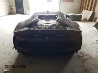 2023 Ferrari SF90 z VIN ZFF95NLA8P0299159, wystawiony jako Copart lot #52724044 z przebiegiem Nie podano mil oraz Szkody całkowita. Historia ofert i sprzedaży dostępna na DreamBid. Obrazek 6.