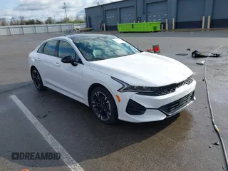2024 Kia K5 GT-Line z VIN 5XXG64J24RG241785, wystawiony jako IAAI lot #42060867 z przebiegiem 23 585 mil mil oraz . Historia ofert i sprzedaży dostępna na DreamBid. Obrazek 1.