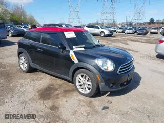 2014 MINI Cooper Paceman with VIN WMWSS1C51EWN94518, listed as a IAAI auction lot 41986247 with 175,940 mi miles. Bid and sale history available at carsss.com. Image 1.