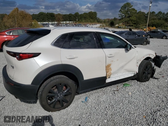2023 Mazda CX-30 Premium with VIN 3MVDMBDY1PM510574, listed as a Copart auction lot 78449424 with 75,631 mi miles and Salvage title. Bid and sale history available at DreamBid. Image 3.