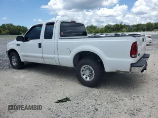 2003 Ford F-250 XL with VIN 1FTNX20L63EB37975, listed as a Copart auction lot 65723935 with 157,377 mi miles and Salvage title. Bid and sale history available at DreamBid. Image 2.