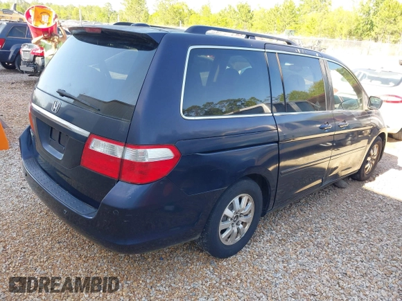 2007 Honda Odyssey Touring with VIN 5FNRL38807B023395, listed as a IAAI auction lot 42047062 with 240,552 mi miles. Bid and sale history available at carsss.com. Image 4.