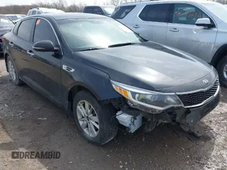 2016 Kia Optima LX with VIN KNAGT4L34G5110742, listed as a IAAI auction lot 41931969 with 128,458 mi miles. Bid and sale history available at carsss.com. Image 1.