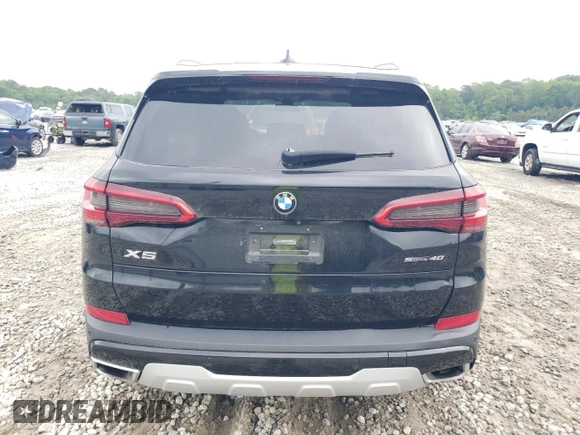 2020 BMW X5 sDrive40i with VIN 5UXCR4C0XLLW63728, listed as a Copart auction lot 56112475 with 65,704 mi miles and Clean title. Bid and sale history available at DreamBid. Image 6.
