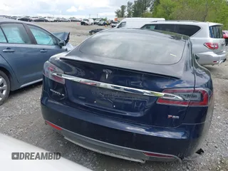 2014 Tesla Model S 60 with VIN 5YJSA1H15EFP43884, listed as a IAAI auction lot 41993180 with 78,305 mi miles and . Bid and sale history available at DreamBid. Image 15.