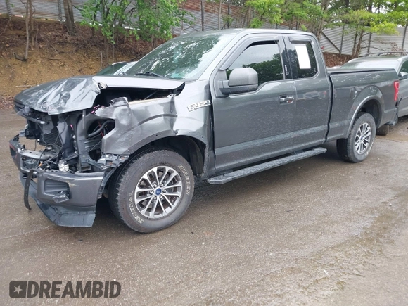 2019 Ford F-150 XL with VIN 1FTEX1EP1KFA77120, listed as a IAAI auction lot 42329608 with 76,053 mi miles and . Bid and sale history available at DreamBid. Image 2.