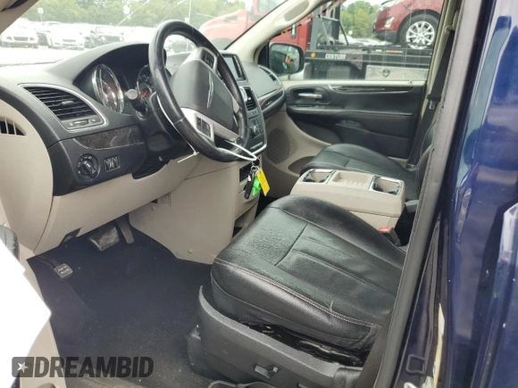 2014 Chrysler Town & Country Touring with VIN 2C4RC1BG2ER197894, listed as a Copart auction lot 69937954 with 142,948 mi miles and Salvage Title. Bid and sale history available at DreamBid. Image 7.