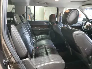 2011 Ford Flex SEL z VIN 2FMHK6CC9BBD13809, wystawiony jako Copart lot #60803244 z przebiegiem 168 183 mil mil oraz Szkoda całkowita • Salvage title. Historia ofert i sprzedaży dostępna na DreamBid. Obrazek 11.