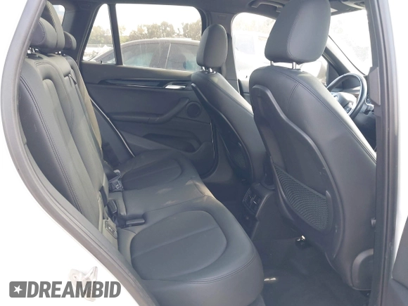 2018 BMW X1 xDrive28i with VIN WBXHT3C37J5K28375, listed as a IAAI auction lot 42039336 with 28,664 mi miles. Bid and sale history available at carsss.com. Image 8.