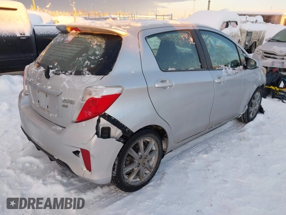 2012 Toyota Yaris L with VIN JTDKTUD34CD506388, listed as a IAAI auction lot 41014347 with 54,427 mi miles. Bid and sale history available at carsss.com. Image 4.