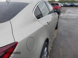 2014 Buick Regal Premium I z VIN 2G4GN5EX4E9323866, wystawiony jako IAAI lot #42072914 z przebiegiem Nie podano mil oraz . Historia ofert i sprzedaży dostępna na DreamBid. Obrazek 11.