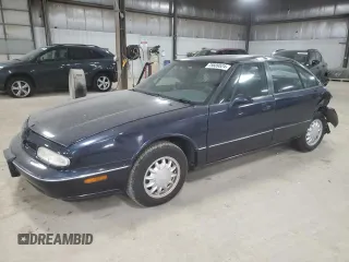 1998 Oldsmobile 88 LS z VIN 1G3HN52K5W4867072, wystawiony jako Copart lot #75689524 z przebiegiem 192 507 mil mil oraz Szkody całkowita. Historia ofert i sprzedaży dostępna na DreamBid. Obrazek 1.