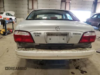 2000 Mazda 626 LX with VIN 1YVGF22C1Y5125842, listed as a Copart auction lot 45637895 with 84,487 mi miles and Salvage Title. Bid and sale history available at carsss.com. Image 6.