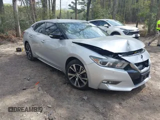 2016 Nissan Maxima SL with VIN 1N4AA6AP9GC406406, listed as a IAAI auction lot 41954790 with 139,380 mi miles and . Bid and sale history available at DreamBid. Image 1.