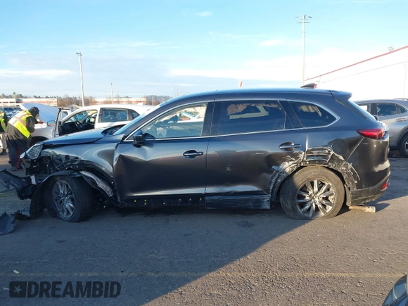 2020 Mazda CX-9 Touring with VIN JM3TCBCY4L0407848, listed as a IAAI auction lot 41008567 with 72,641 mi miles. Bid and sale history available at carsss.com. Image 14.
