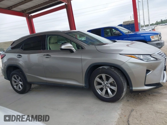 2018 Lexus RX 350 z VIN 2T2BZMCA3JC151296, wystawiony jako IAAI lot #41331203 z przebiegiem 73 051 mil mil oraz . Historia ofert i sprzedaży dostępna na DreamBid. Obrazek 13.
