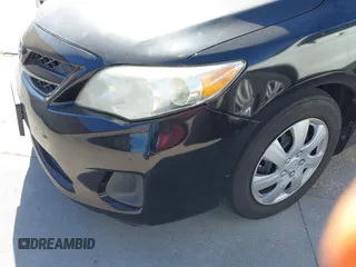 2012 Toyota Corolla L with VIN 5YFBU4EE8CP061390, listed as a IAAI auction lot 41872545 with 104,476 mi miles. Bid and sale history available at carsss.com. Image 6.