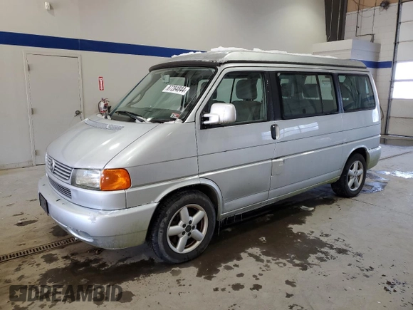2003 Volkswagen EuroVan MV с VIN WV2NB47073H001005, выставлен на аукционе Copart как лот 87284844 с пробегом 283 979 миль миль и Чистый • Clean title. История ставок и продаж доступна на DreamBid. Изображение 1.