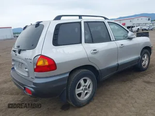 2003 Hyundai Santa Fe GLS z VIN KM8SC73DX3U357525, wystawiony jako IAAI lot #42436777 z przebiegiem 228 844 mil mil oraz . Historia ofert i sprzedaży dostępna na DreamBid. Obrazek 4.