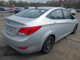 2014 Hyundai Accent GLS with VIN KMHCT4AE0EU622079, listed as a IAAI auction lot 42132818 with 132,324 mi miles. Bid and sale history available at carsss.com. Image 4.