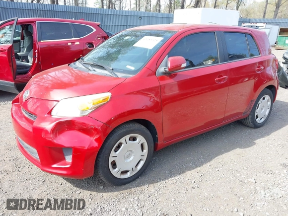 2010 Scion xD with VIN JTKKU4B43A1004049, listed as a IAAI auction lot 42088528 with 98,360 mi miles. Bid and sale history available at carsss.com. Image 2.