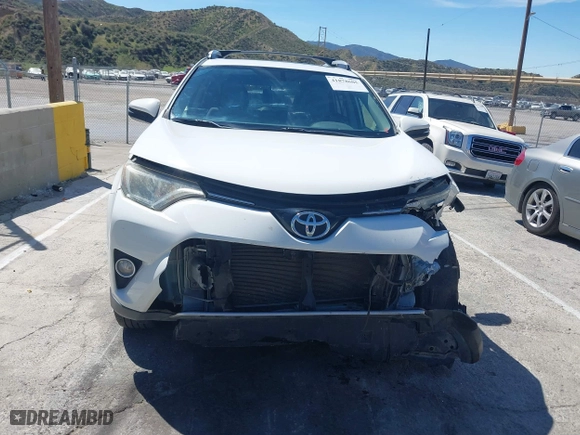 2016 Toyota RAV4 XLE with VIN JTMWFREV5GJ098870, listed as a IAAI auction lot 41878605 with 109,996 mi miles. Bid and sale history available at carsss.com. Image 12.