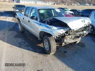 2004 Dodge Dakota Sport with VIN 1D7HG38K34S561735, listed as a IAAI auction lot 41409622 with Not Provided miles. Bid and sale history available at carsss.com. Image 1.