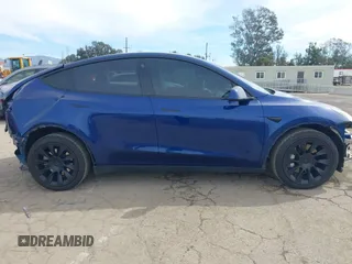 2022 Tesla Model Y Long Range with VIN 7SAYGDEE0NA019067, listed as a IAAI auction lot 41645198 with 49,336 mi miles and . Bid and sale history available at DreamBid. Image 14.
