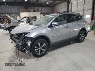 2018 Toyota RAV4 XLE with VIN 2T3RFREV2JW823198, listed as a Copart auction lot 60289175 with Not provided miles and Salvage title. Bid and sale history available at DreamBid. Image 1.
