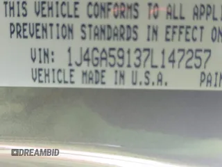 2007 Jeep Wrangler Unlimited Sahara z VIN 1J4GA59137L147257, wystawiony jako IAAI lot #41565673 z przebiegiem 187 982 mil mil oraz . Historia ofert i sprzedaży dostępna na DreamBid. Obrazek 9.
