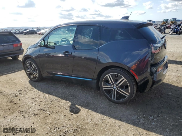 2014 BMW i3 with VIN WBY1Z2C58EV285102, listed as a Copart auction lot 42879385 with 58002 miles and Salvage Title. Bid and sale history available at carsss.com. Image 2.