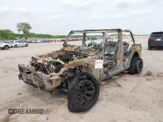 2021 Jeep Wrangler Unlimited Freedom with VIN 1C4HJXDN8MW765099, listed as a IAAI auction lot 42394438 with Not provided miles and . Bid and sale history available at DreamBid. Image 2.