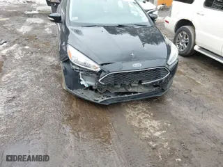 2016 Ford Focus SE with VIN 1FADP3FE7GL236032, listed as a IAAI auction lot 41597830 with 116,312 mi miles. Bid and sale history available at carsss.com. Image 6.