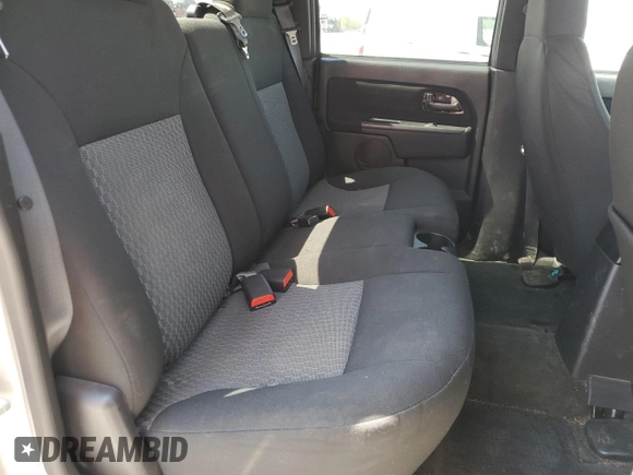 2007 GMC Canyon SLE2 z VIN 1GTDT13E678189156, wystawiony jako Copart lot #52403215 z przebiegiem 144 312 mil mil oraz Czysty tytuł • Clean title. Historia ofert i sprzedaży dostępna na DreamBid. Obrazek 10.