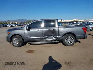 2020 Nissan Titan Platinum Reserve with VIN 1N6AA1EF8LN512582, listed as a IAAI auction lot 42236611 with 18,375 mi miles and . Bid and sale history available at DreamBid. Image 14.