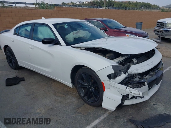 2018 Dodge Charger SXT Plus with VIN 2C3CDXHG4JH187580, listed as a IAAI auction lot 42024602 with 203,843 mi miles and . Bid and sale history available at carsss.com. Image 1.