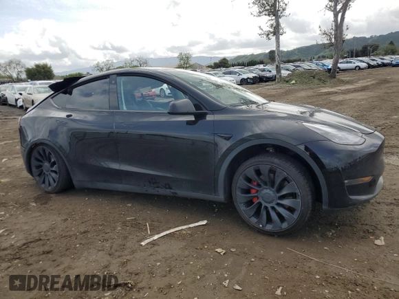 2022 Tesla Model Y Performance with VIN 7SAYGDEF1NF404133, listed as a Copart auction lot 51108165 with 44,102 mi miles and Salvage Title. Bid and sale history available at DreamBid. Image 4.