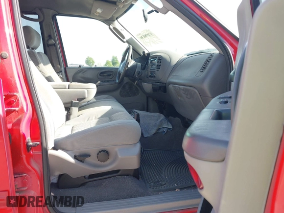 2003 Ford F-150 XLT with VIN 1FTRW08L43KD14456, listed as a IAAI auction lot 42098830 with 234,908 mi miles. Bid and sale history available at carsss.com. Image 5.