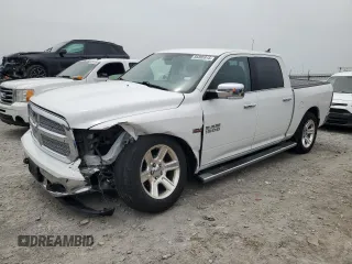 2018 Ram 1500 Lone Star Silver with VIN 1C6RR6LT6JS266013, listed as a Copart auction lot 56895915 with 136,453 mi miles and Salvage title. Bid and sale history available at DreamBid. Image 1.