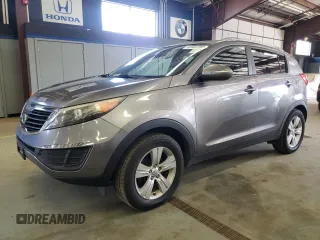2012 Kia Sportage LX with VIN KNDPB3A2XC7267233, listed as a Copart auction lot 63487395 with 225,015 mi miles and Clean title. Bid and sale history available at DreamBid. Image 1.
