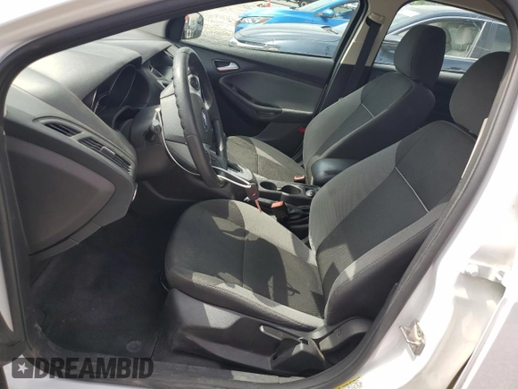 2013 Ford Focus SE z VIN 1FADP3F29DL374088, wystawiony jako Copart lot #59585135 z przebiegiem 74 997 mil mil oraz Szkoda całkowita • Salvage title. Historia ofert i sprzedaży dostępna na DreamBid. Obrazek 7.