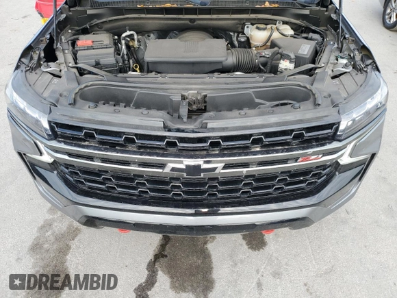 2021 Chevrolet Suburban Z71 с VIN 1GNSKDKD9MR385447, выставлен на аукционе Copart как лот 55764935 с пробегом 74 241 миль миль и Списание • Salvage title. История ставок и продаж доступна на DreamBid. Изображение 12.